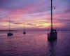 Sailboats anchored off the  beach